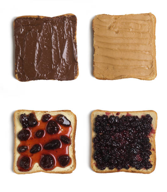 istock Four toast bread with jam and chocolate paste and peanut butter 1322687384