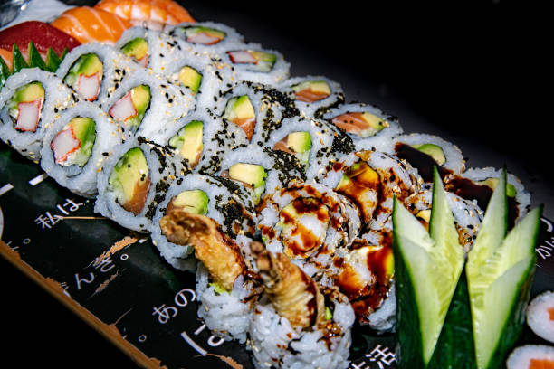 istock Selection of sushi rolls on a skateboard 1322687636