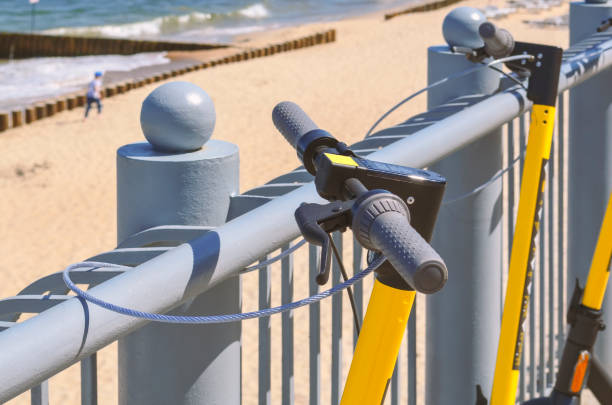 istock Electric scooters parked on the waterfront for rent 1322687777