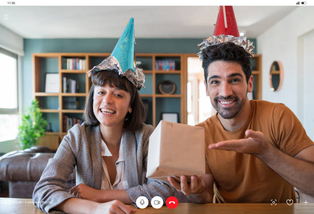 istock Couple celebrating birthday from home. 1322690354