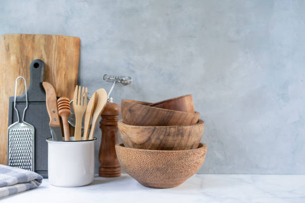 istock Wooden kitchen background with kitchen utensils 1322692908