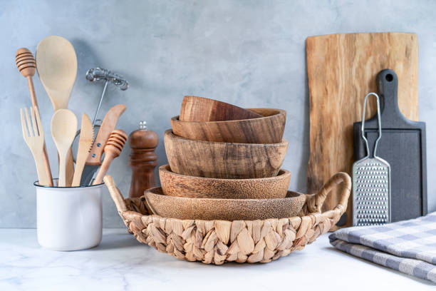 istock Wooden kitchen background with kitchen utensils 1322693644