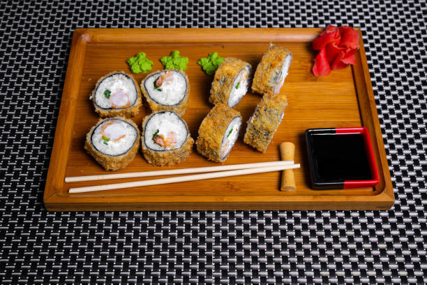 istock Sushi roll isolated on white close up 1322694843