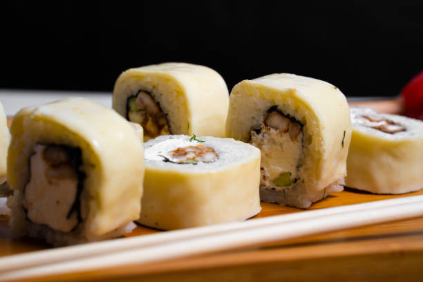 istock Sushi roll isolated on white close up 1322694897