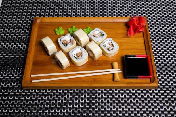 istock Sushi roll isolated on white close up 1322694898