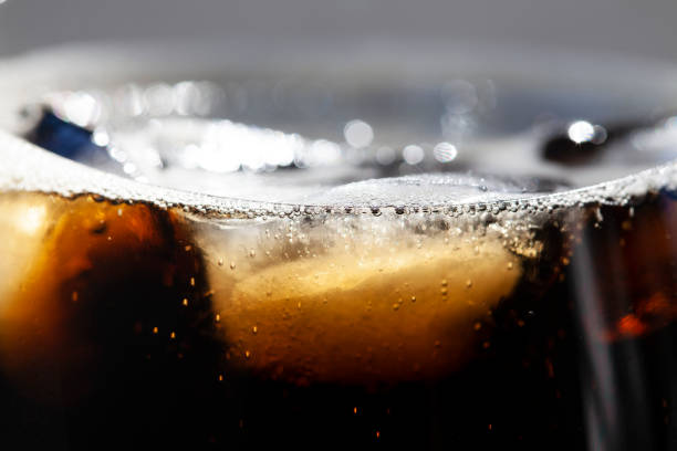istock close-up bubbles and ice in a coke glass 1322697563
