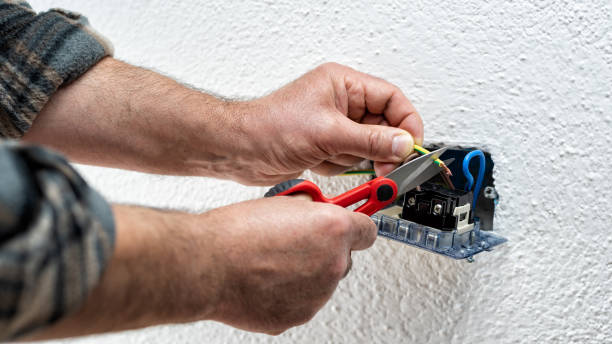istock Electrician at work on a residential electrical system. Electricity. 1322699174
