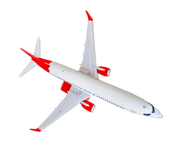 istock White plane isolated on white background. The charter passenger plane is flying 1322706038