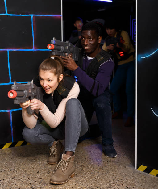 istock Two nice laser tag players during lasertag game 1322712341