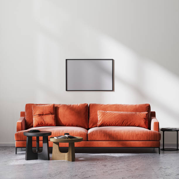 istock empty horizontal frame mock in modern living room interior with red sofa and wooden coffee tables, white wall and raw concrete floor, scandinavian minimalistic style, 3d rendering 1322713358