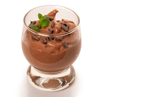 istock Vegan chocolate mousse glass isolated on white background. 1322713663