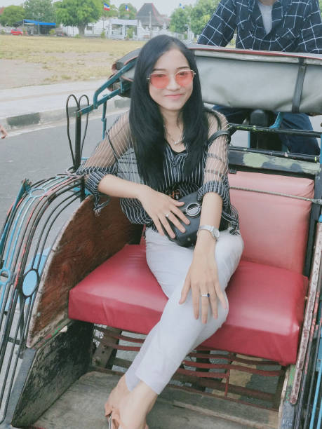 istock Women in traditional public transportation 1322716751
