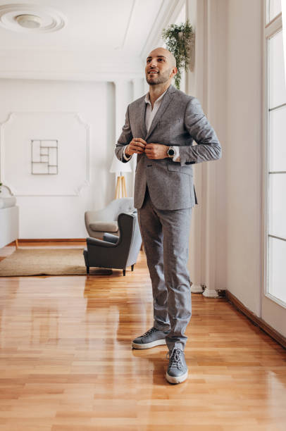 istock Handsome gentleman in modern apartment 1322716770