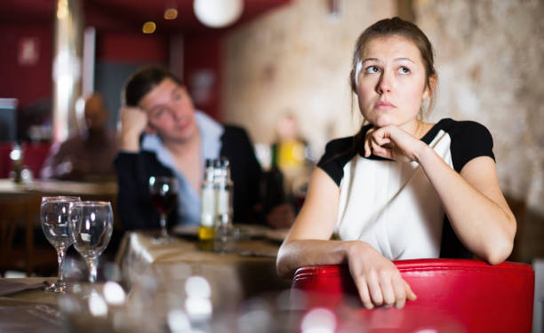 istock Girl upset because her boyfriend drinking too much 1322718097