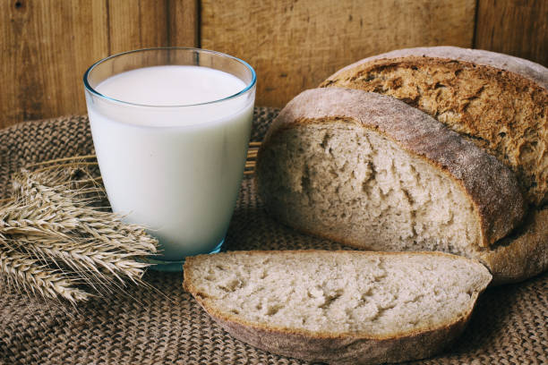 istock Bread and milk. Simple rustic food. 1322721296