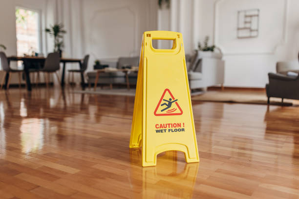istock Yellow caution wet floor sign in apartment 1322726085
