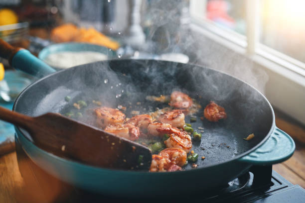istock Preparing Shrimp and Grits in Domestic Kitchen 1322726222