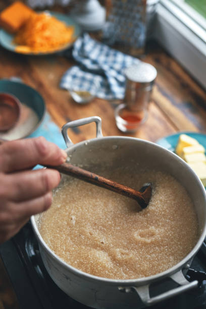 istock Preparing Shrimp and Grits in Domestic Kitchen 1322726296