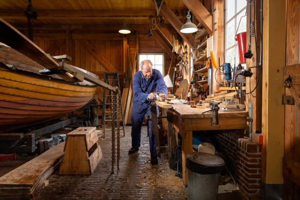 istock Boat building craftsmen 1322728910