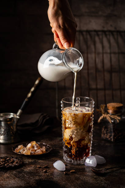 istock Ice coffee in a tall glass 1322731684