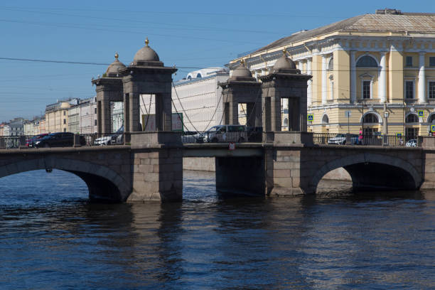 istock Old stone bridge over the river in the city 1322733983