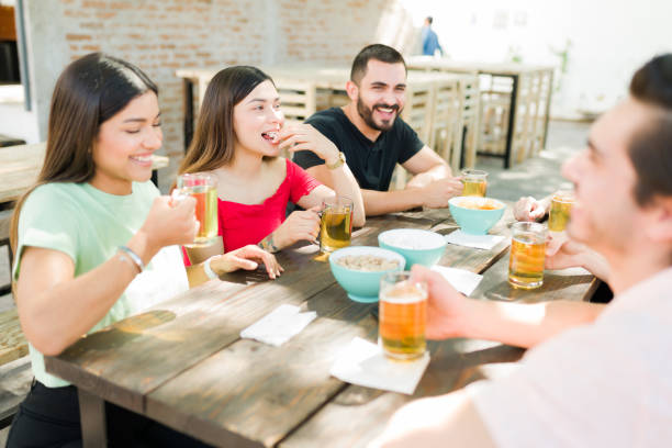 istock Enjoying a relaxing evening out with friends 1322737169