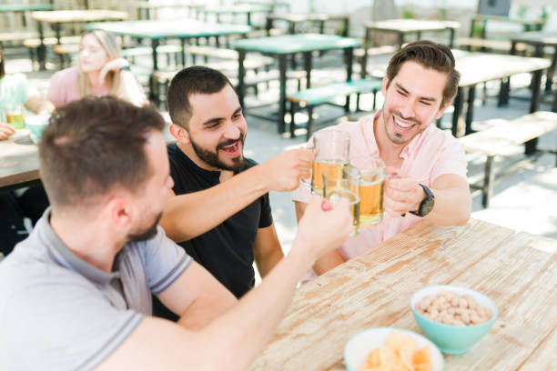 istock Excited young men toasting with beer 1322738712