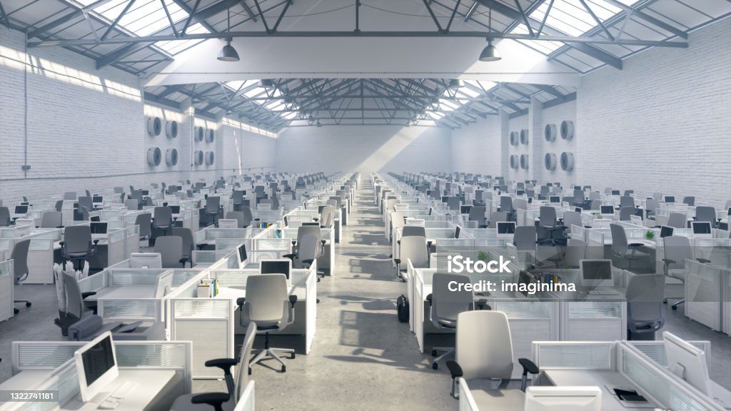 Large Call Center In A Warehouse Empty large call center with cubicles in a warehouse. Call Center Stock Photo