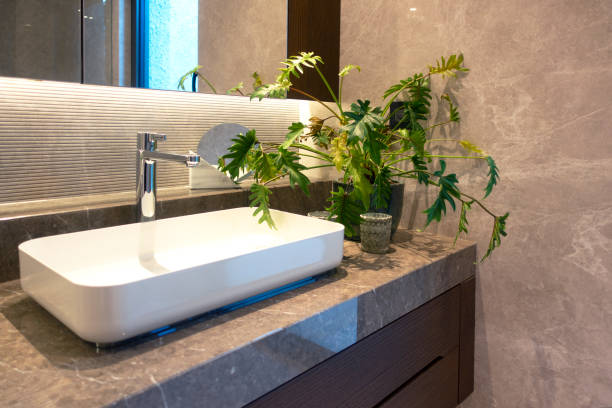 istock Silver tap in elegant bathroom 1322742117