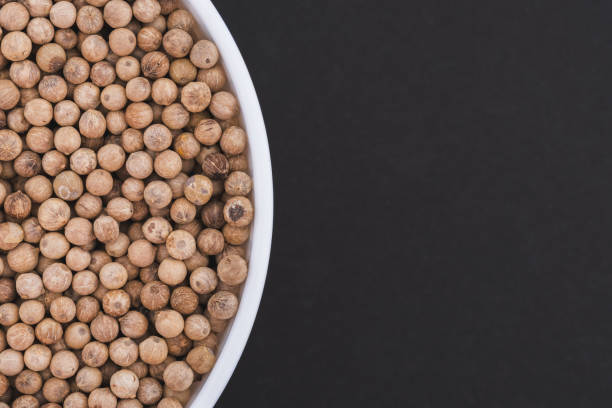 White glass bowl of white pepper.