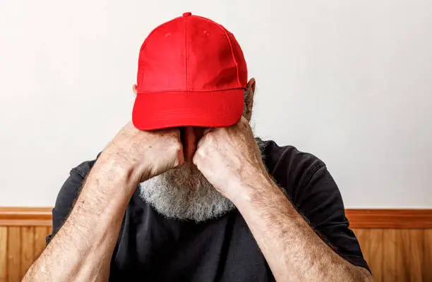Photo of Red Hat Redneck Senior Man Crying