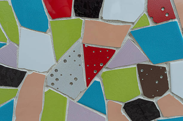 istock Colorful mosaic from broken ceramic tiles on wall 1322746045