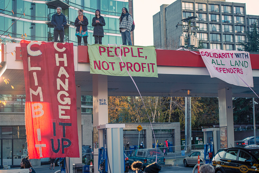 Vancouver, Canada, November 29. 2015. \nClimate change march on the streets of Vancouver, demanding immediate environmental and ecological action to save the international and global climate