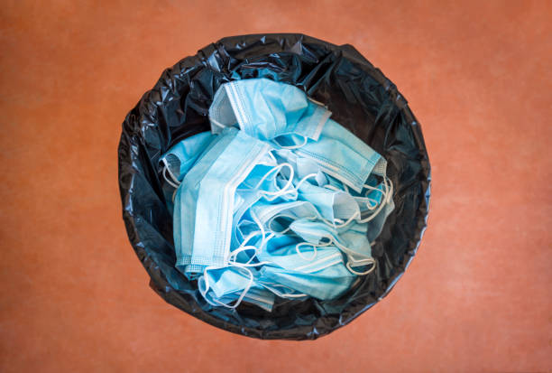 istock Trash full of Medical face mask 1322752169