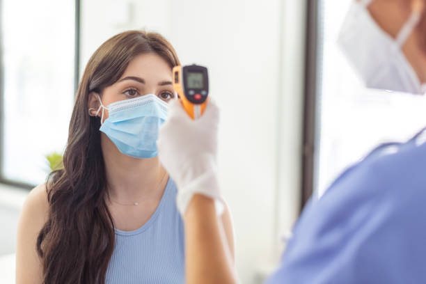 istock You can only enter the clinic after having your temperature checked 1322753273