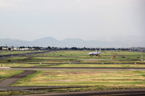 istock Airplane on runway getting ready for take off or parking 1322753469