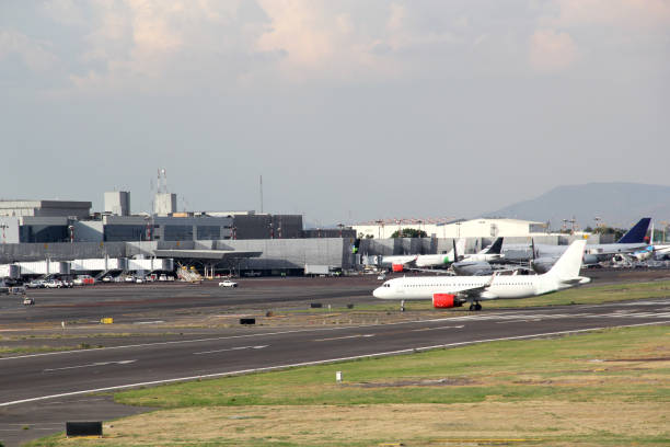 istock Airplane on runway getting ready for take off or parking 1322753472