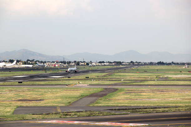 istock Airplane on runway getting ready for take off or parking 1322753478