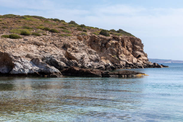 istock Wild Aegean sea with rocky cliffs and blue water 1322755660