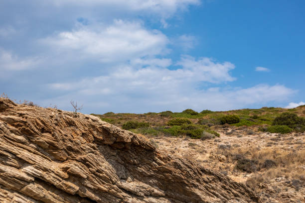 istock Steppe Greece terrain landscape with scenic clouds 1322755760