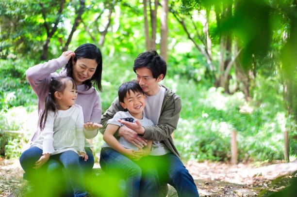 istock A happy family observing insects 1322756881