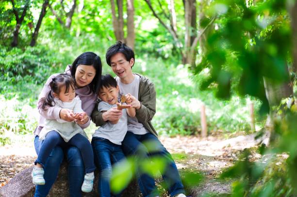 istock A happy family observing insects 1322756886