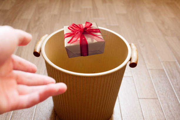 istock Throw unwanted gifts into the trash 1322775827