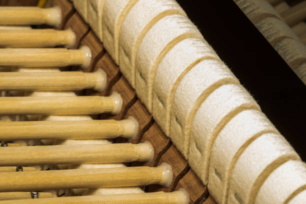 istock Macro Image of Grand Piano Hammer Shank and Knuckle 1322778347
