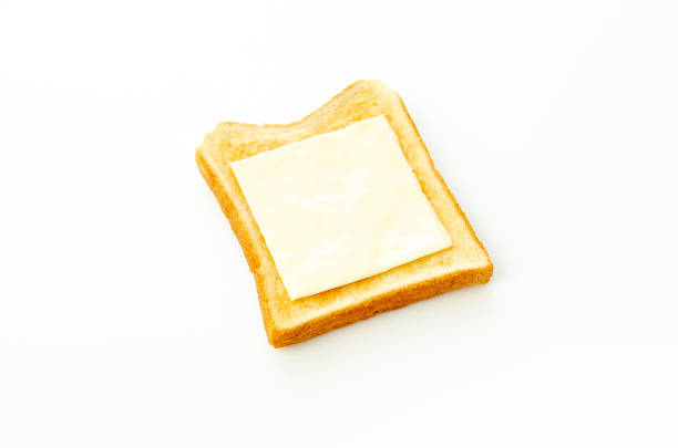 istock slices of cheese on toast isolated on white background 1322782242