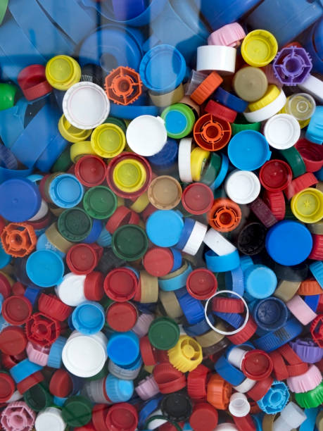 istock Recycling collection and processing of plastic bottle caps. The cover material is recyclable. 1322783113