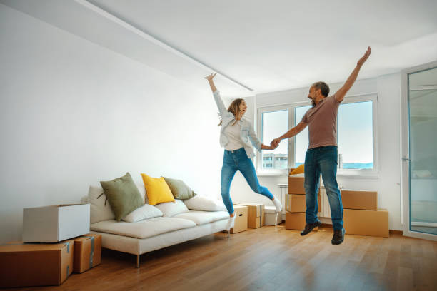 istock Young couple moving in together. 1322787825