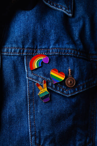 istock Rainbow lgbtq flag badges against denim background, pride month 1322788842