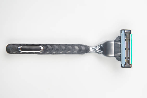 istock razor blade on white background. manual face shaving machine. stubble blade. depilation 1322792090