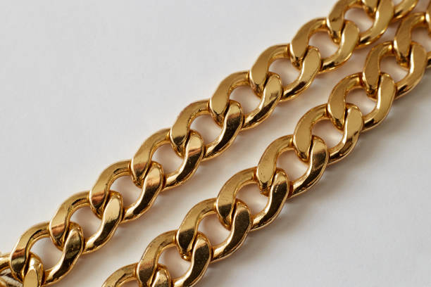istock gold chain on a light background close-up, wealth luxury 1322793735